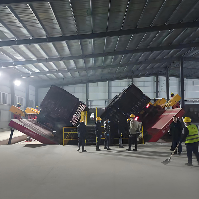 Dumpers automatiques pour camions à rotation latérale Dumpers automatiques pour camions à rotation latérale